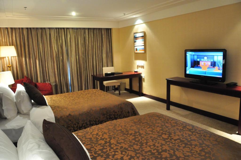New Cozy Harbour Hotel Nanning Ruang foto